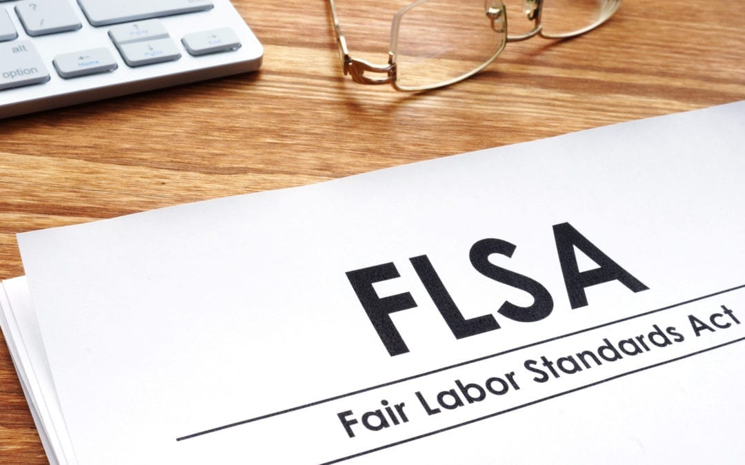 Fair Labor Standards Act Flsa On A Desk.